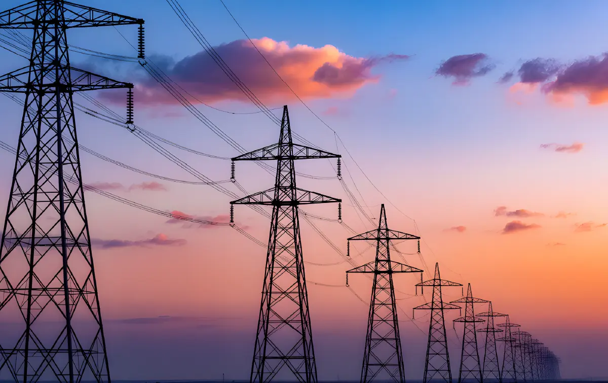 Electricity transmission towers representing an energy company’s IT landscape and infrastructure.